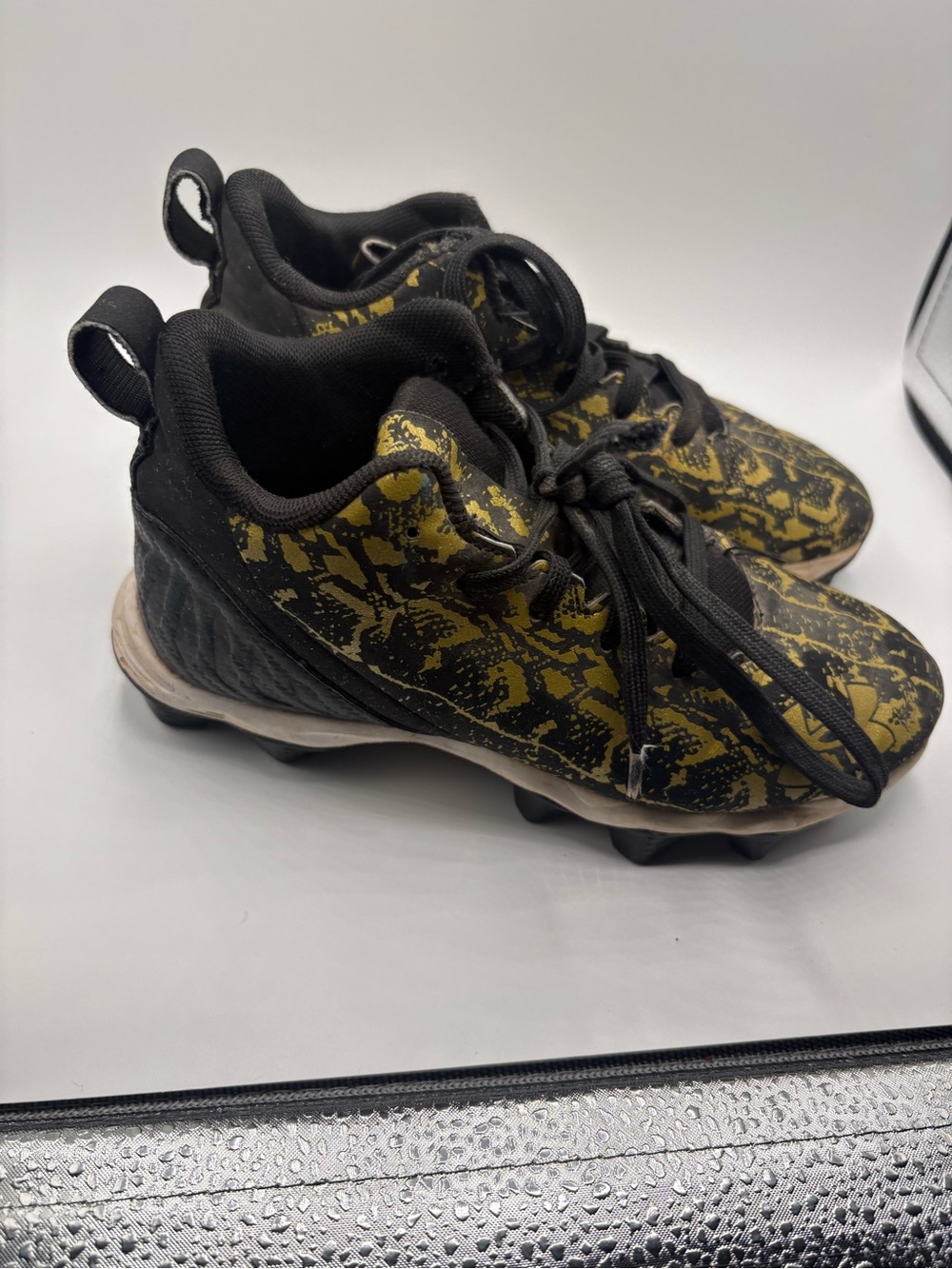Under Armour Kids Black and Yellow Patterned Cleats - Lace-Up Soccer Shoes